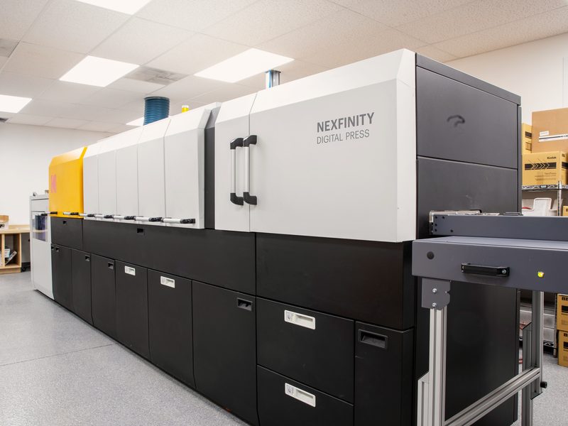 Kodak Nexfinity digital press in the GLO Document Solutions area