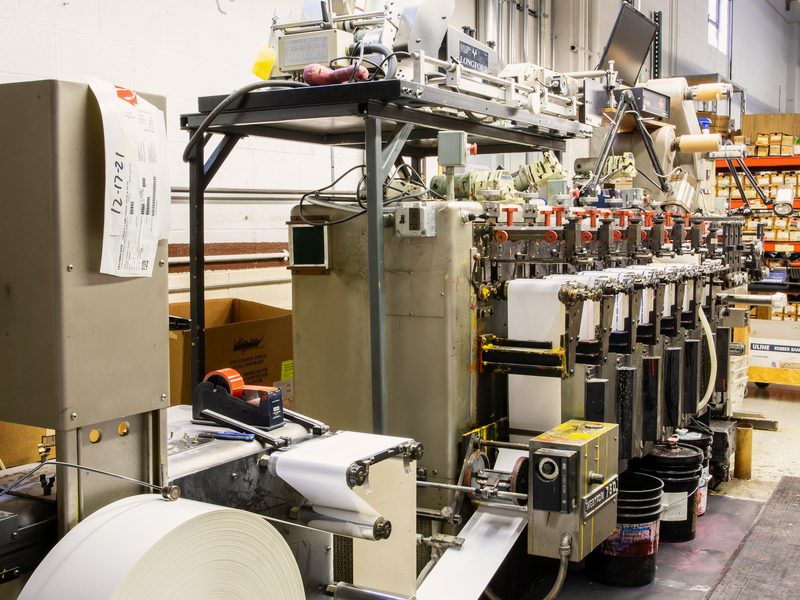 Narrow-web flexographic label press running a roll of label stock