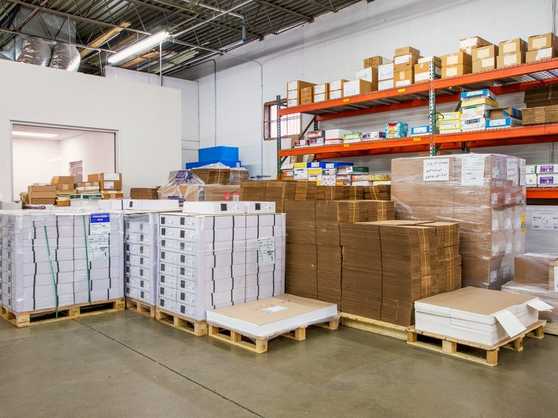 Pallet racking and boxed finished goods in the DistCom fulfillment warehouse