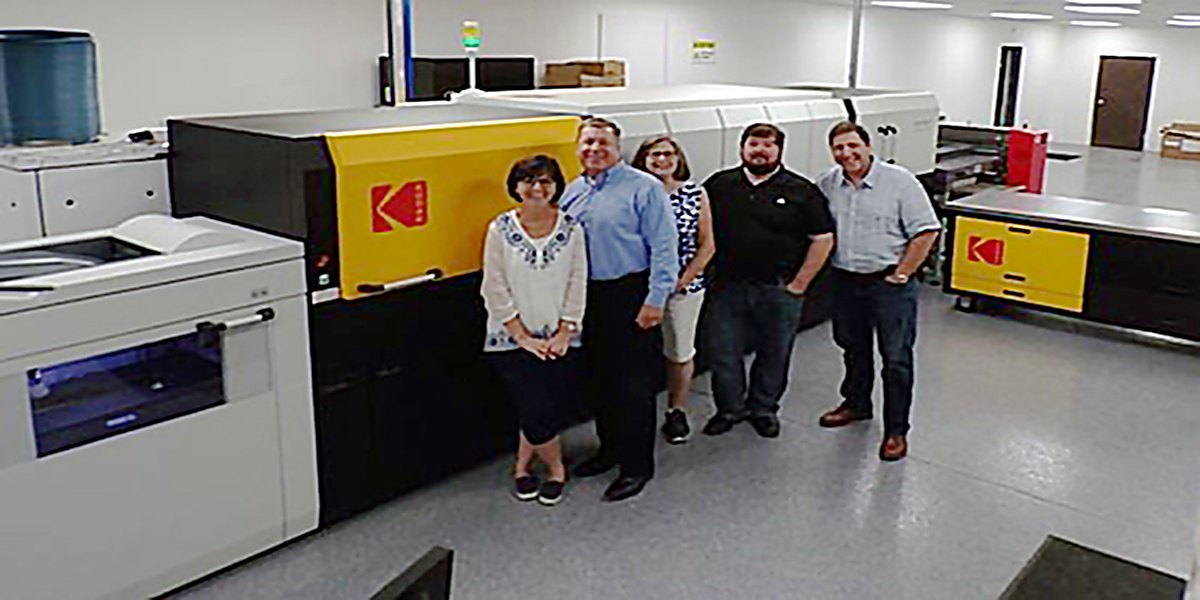 Bell Litho, Inc. team members at the Kodak Nexfinity digital press