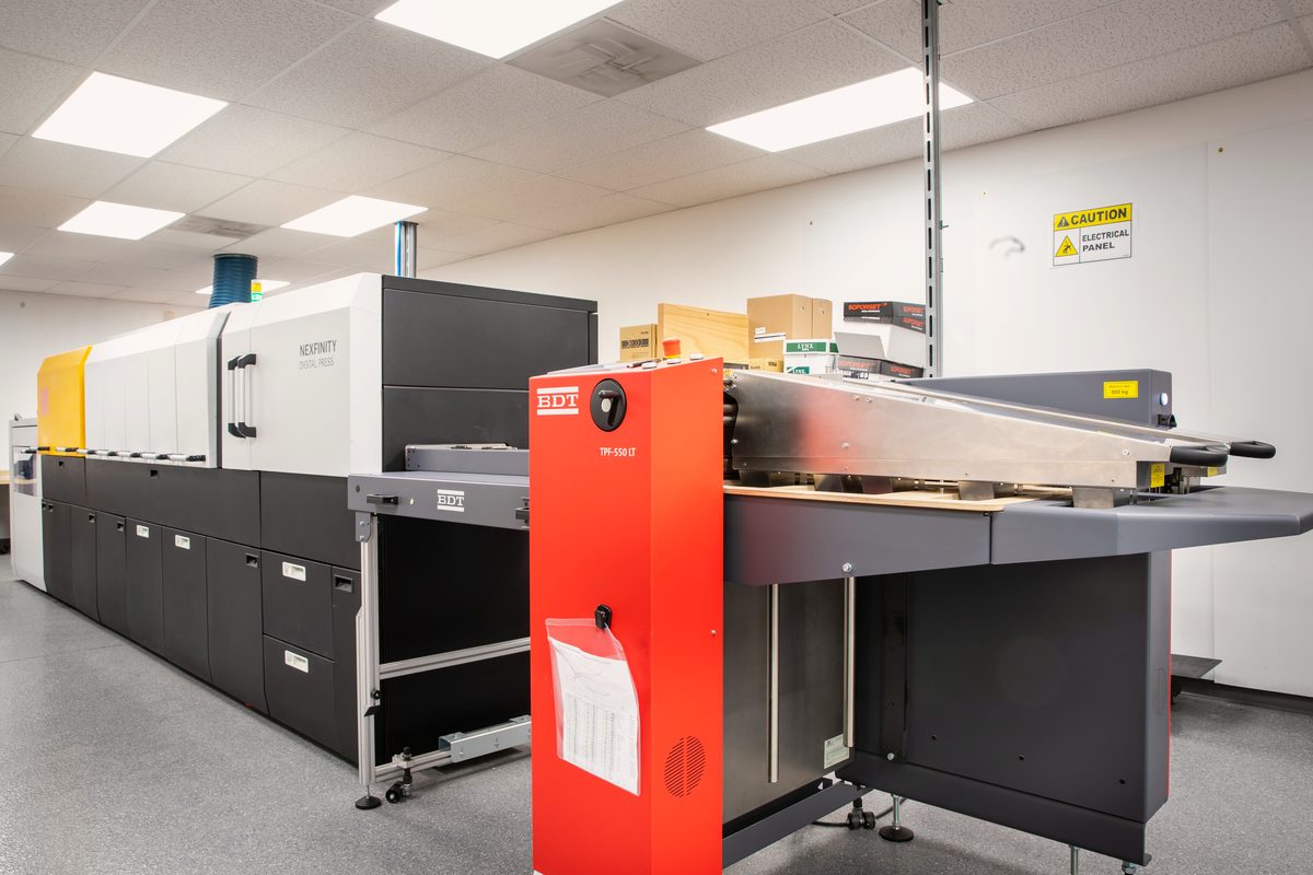 Kodak Nexfinity digital press at Bell Litho, Inc., where personalized direct mail letters and postcards are printed